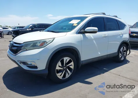 2015 Honda Cr-V Touring from USA, damaged, VIN 5J6RM3H91FL021912